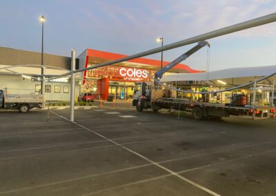 Crane to install carpark barrel vault shade rafter steel work