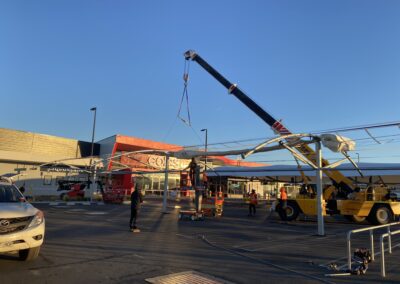 Coles car park shade structure made from waterproof PVC material. Installation by crane