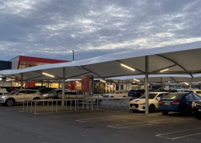 Car park shade structure - Coles car park shade structure at dusk