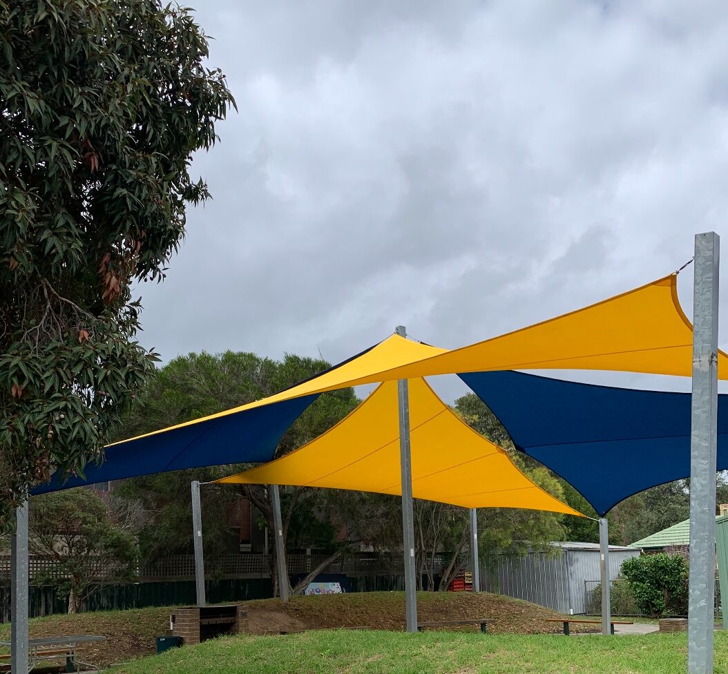 School Shade Sails - 4x Shade Sails Central post - Large Shade Structure Posts - Yellow and Blue Shade Sails